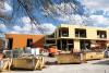 Teams working on The Kendeda Building are striving for net positive waste during construction. Seen here, materials are separated into recycling dumpsters.