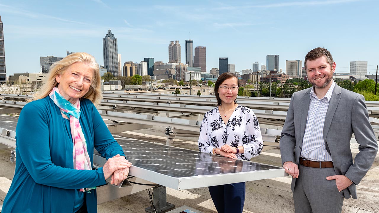 Marilyn Brown, Regents Professor in the School of Public Policy, poses with Greenlink Group Chief Technology Officer Xiaojing Sun, and Matt Cox, the company's chief executive officer and founder. Sun and Cox worked with Brown while the ATHENIA energy modeling platform was under development at the Climate and Energy Policy Lab at the Georgia Institute of Technology.