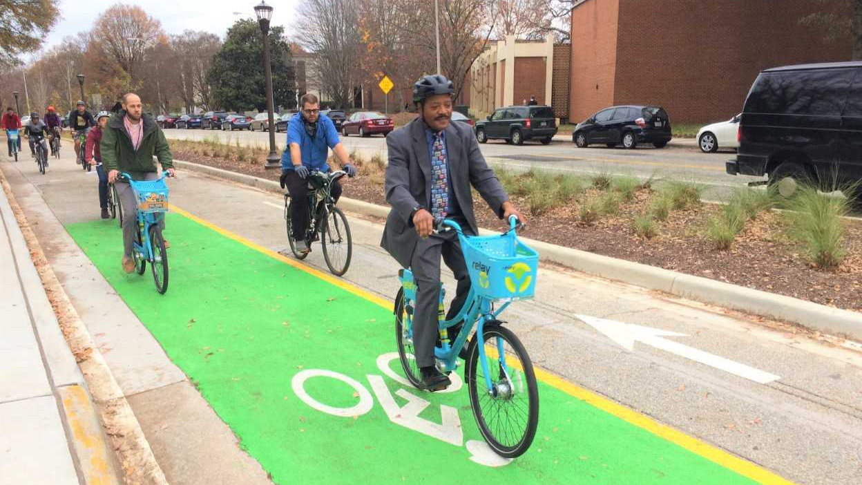 Cyclists ride during the PATH Parkway ribbon-cutting event on Dec. 5.