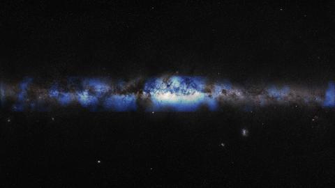 An artist’s composition of the Milky Way seen with a neutrino lens (blue). (IceCube Collaboration/U.S. National Science Foundation (Lily Le & Shawn Johnson)/ESO (S. Brunier))